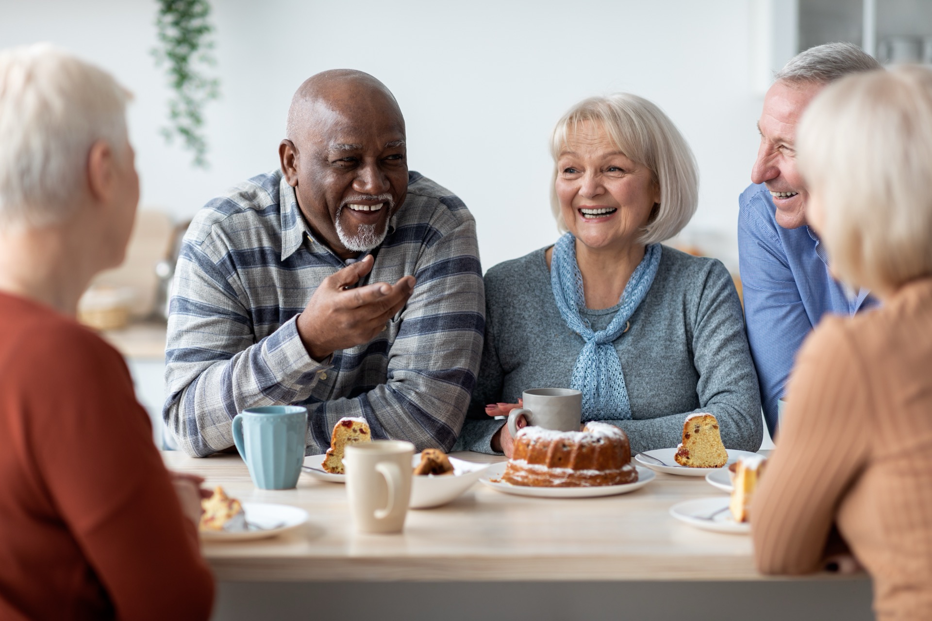 Seniors enjoying a meal in care facility